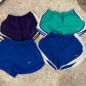 4 pair of medium Nike shorts